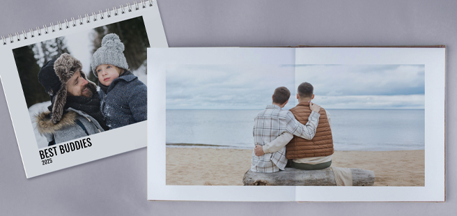 Closed photobook showing photos of a son and father on the cover that reads 'my dad is my superhero'.